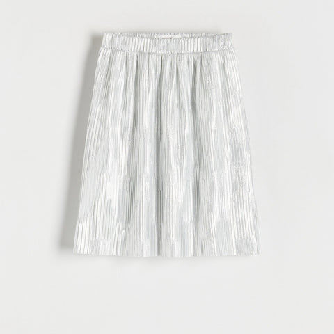 Silver pleated skirt on a light gray background