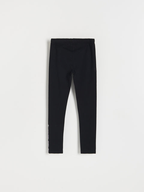 Black leggings on a white background