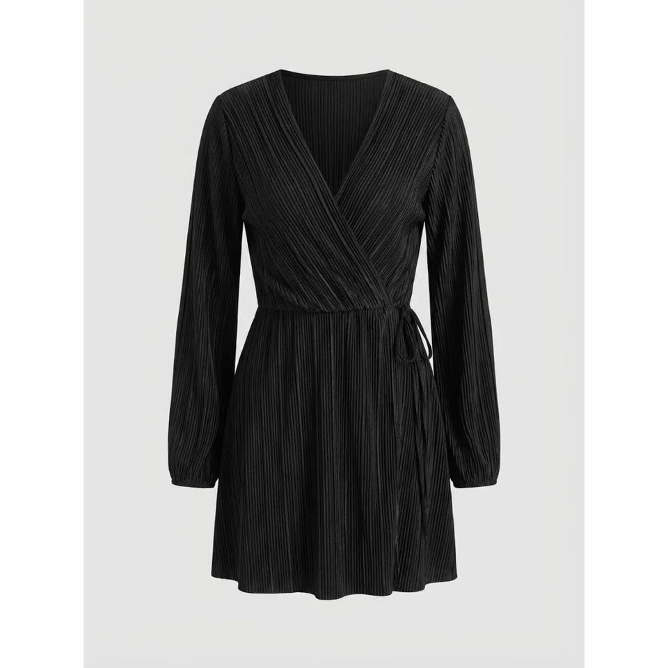 A black long-sleeve wrap dress with a pleated texture, featuring a V-neckline and a self-tie waist belt, shown against a light gray background.