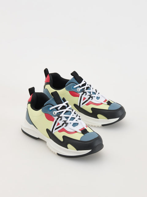 Colorful sneakers on a light gray background