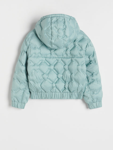 Light blue quilted jacket on a light gray background