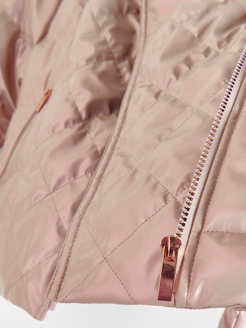 Close-up of a pink quilted jacket with a zipper on a light gray background
