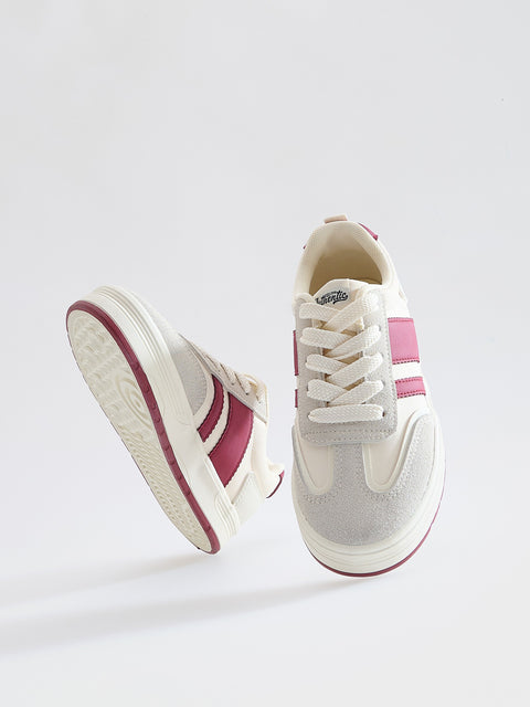 White and pink sneakers on a white background