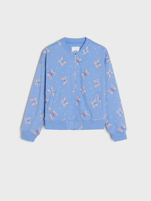 Blue bomber jacket with butterfly pattern on a light gray background