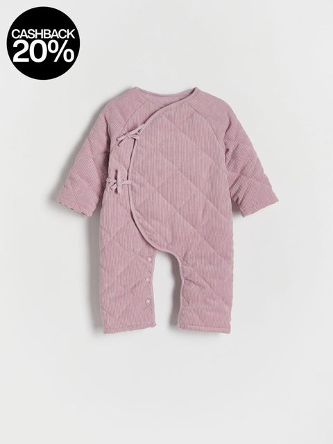 Pink quilted baby romper on a light gray background with a cashback 20% badge.