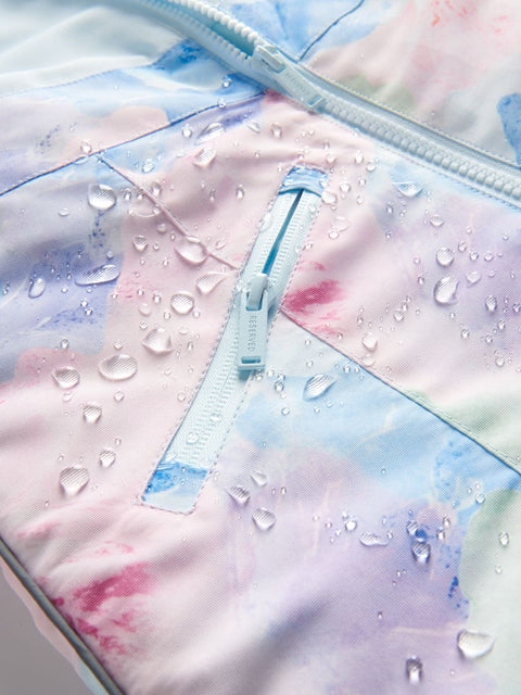 Close-up of a colorful jacket with water droplets on the fabric