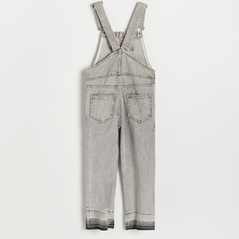 Denim overalls on a white background
