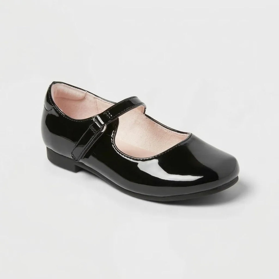 A single black patent leather Mary Jane shoe with a low heel, shown from a three-quarters angle on a light gray background.