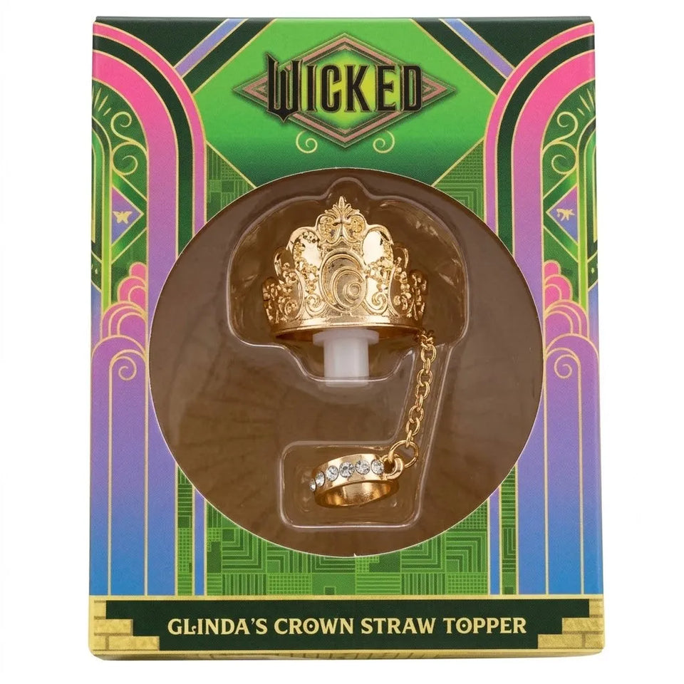 Wicked Glinda's Crown Straw Topper in its original packaging, featuring a gold crown and matching ring displayed in a clear circular window on a colorful Art Deco box.