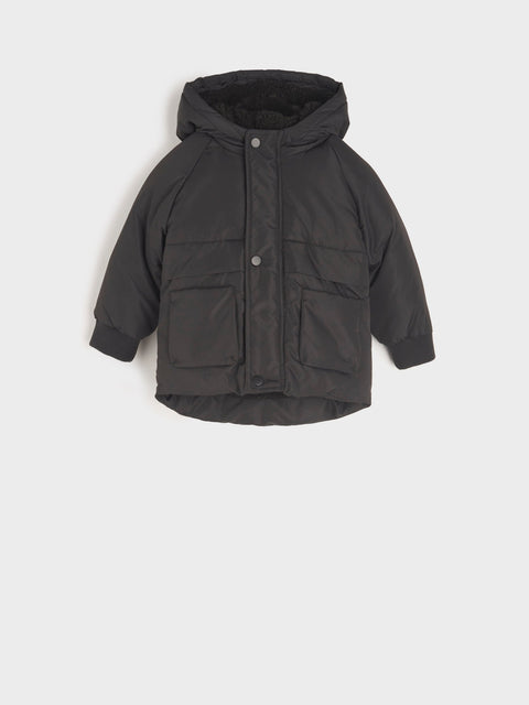 Black puffer jacket on a white background
