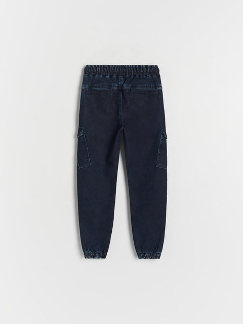 Dark blue cargo jogger pants on a light gray background