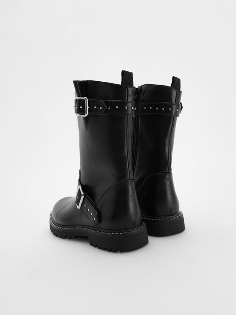 Black leather boots with buckles on a white background