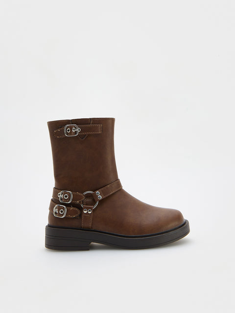 Brown boot with buckles on a white background