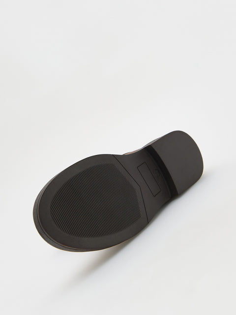 Black shoe sole on a white background