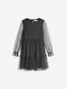 Black dress with sheer sleeves on a white background