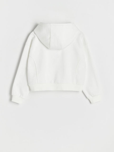 White top on a light gray background