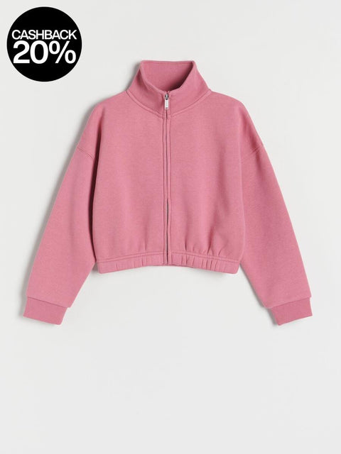 Pink zip-up sweatshirt on a light gray background
