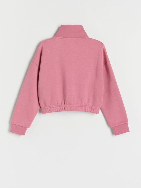 Pink jacket on a light gray background