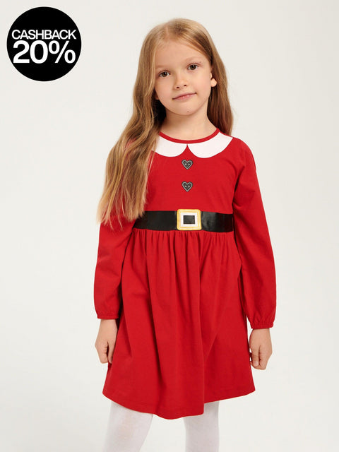 Young girl wearing a red dress with a black belt on a white background