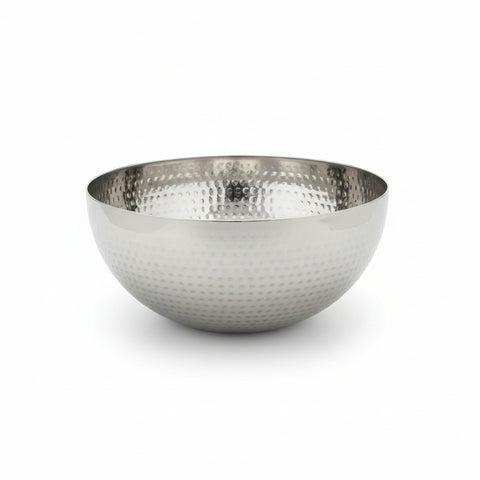 Silver hammered metal bowl on a white background