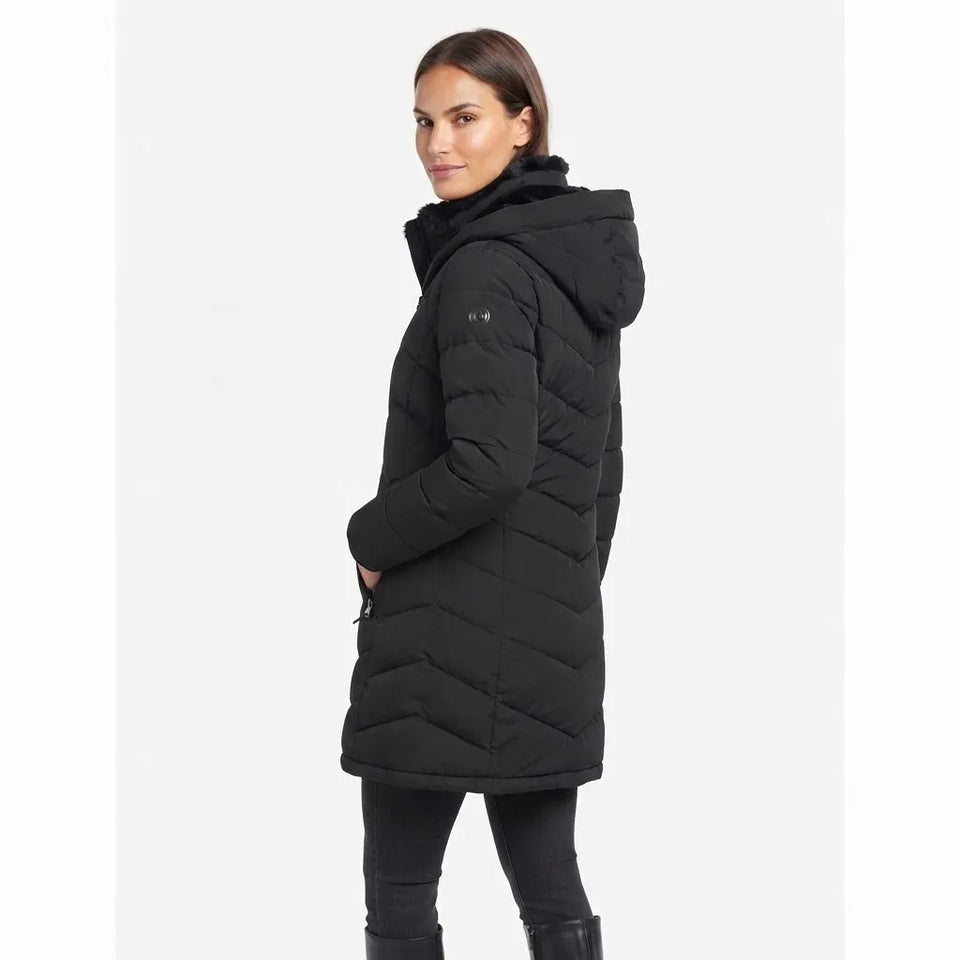 A woman modeling a black hooded puffer coat with horizontal quilting, shown from a side-back angle against a plain light gray studio background.