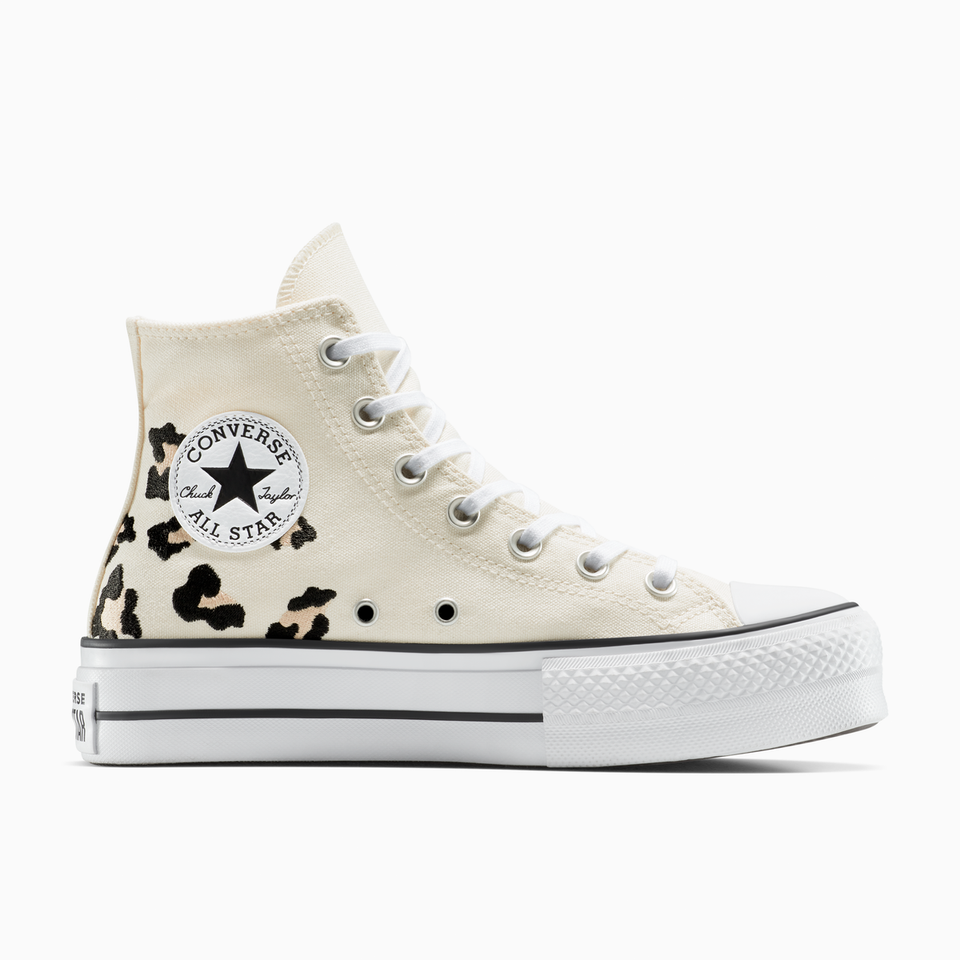 White high-top sneaker with leopard print accents and Converse logo on a white background