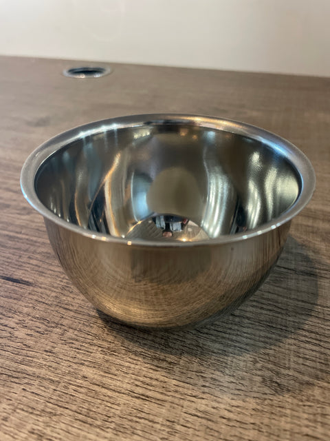 Metallic door handle on a wooden door