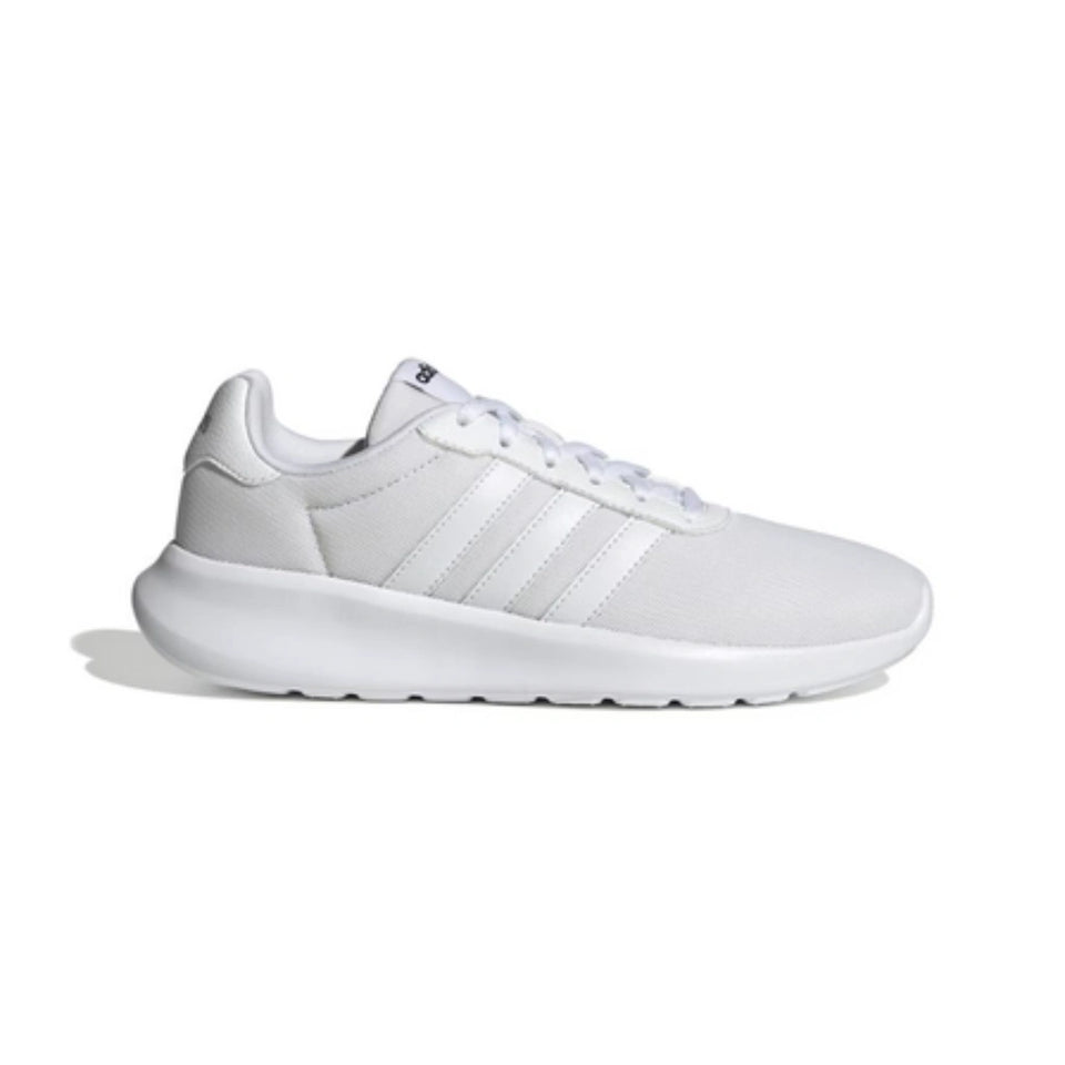 Black and blue sneaker with a white sole on a light gray background