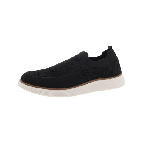 Black slip-on shoe with a white sole on a white background