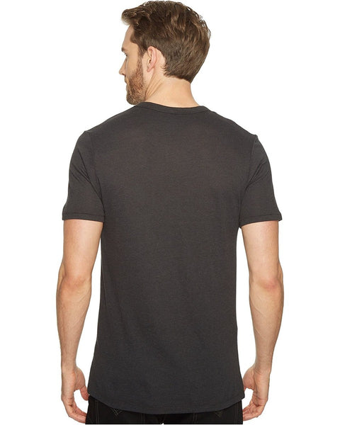 Man wearing a black t-shirt on a white background