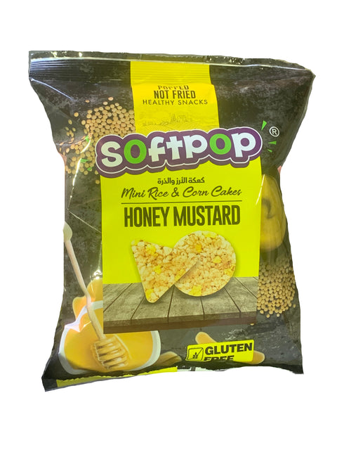 Packaged snack with 'SoftPop' branding on a dark surface