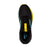 Black running shoe with yellow accents on a white background