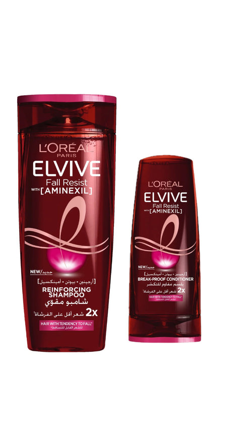 L'Oreal Elvive shampoo and conditioner bottles on a white background