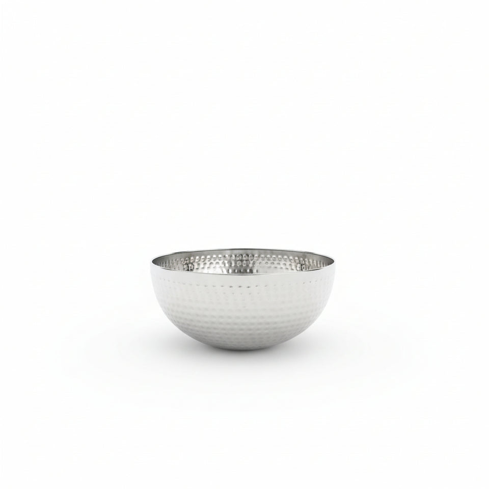 Silver bowl with textured surface on a white background