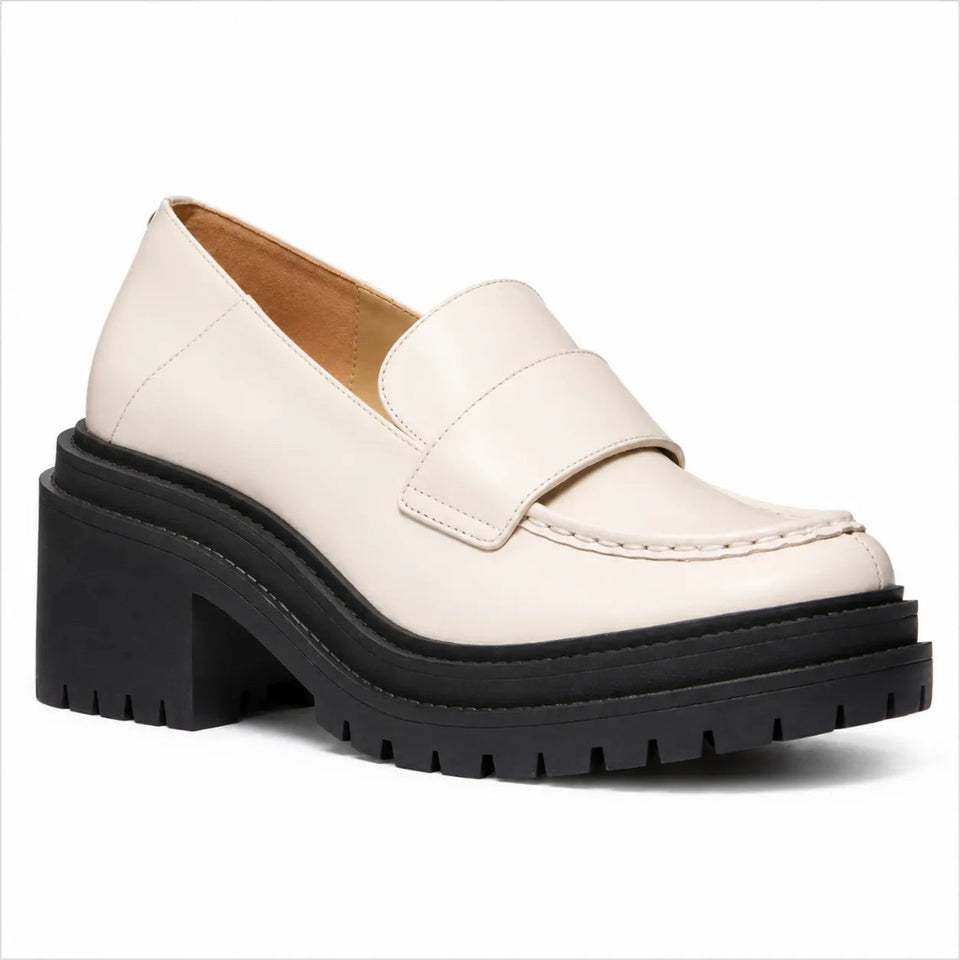 A single cream-colored leather loafer with a chunky black platform sole and block heel, shown from a three-quarters angle on a white background.