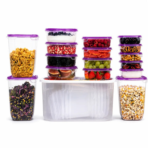 Set of stacked food containers with various snacks on a white background