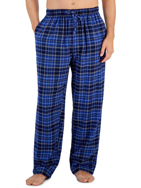 Blue plaid pajama pants worn by a person on a white background