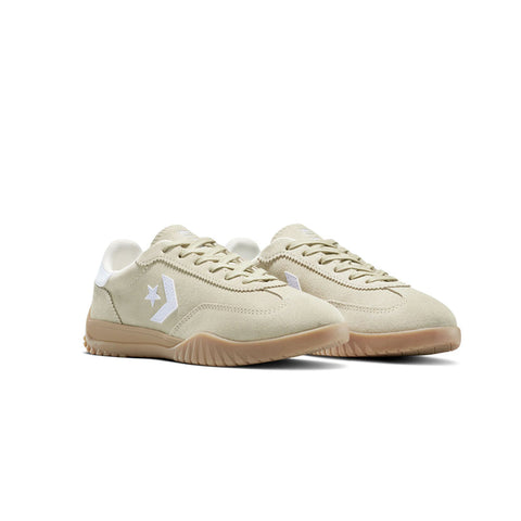Beige sneakers with white sole on a white background