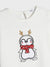White t-shirt with a penguin wearing reindeer antlers and a red scarf design on a white background.