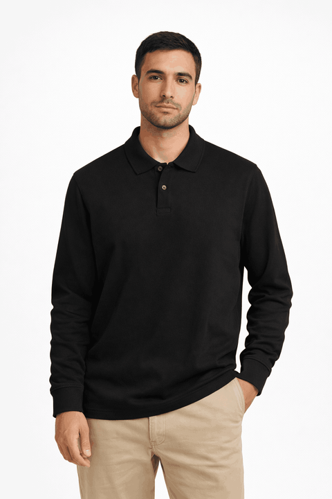 Man wearing a black long-sleeve polo shirt and beige pants on a white background