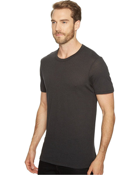 Man wearing a black t-shirt on a white background