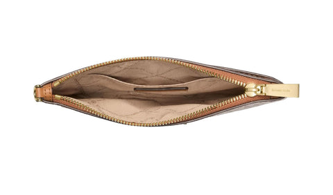 Open brown leather pouch with gold zipper on a white background
