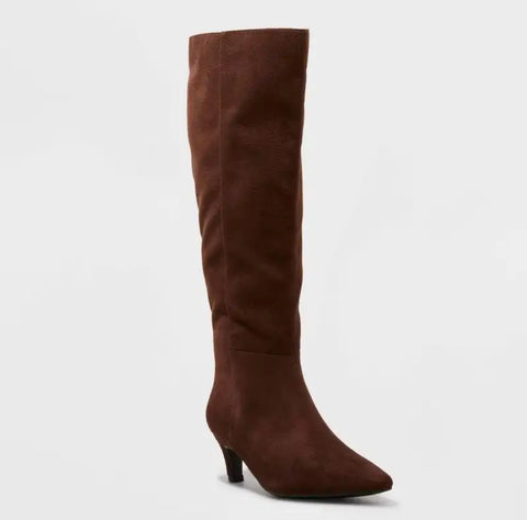 Brown knee-high boot on a light gray background