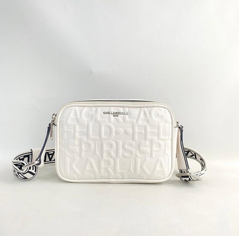 White Karl Lagerfeld handbag on a light gray background