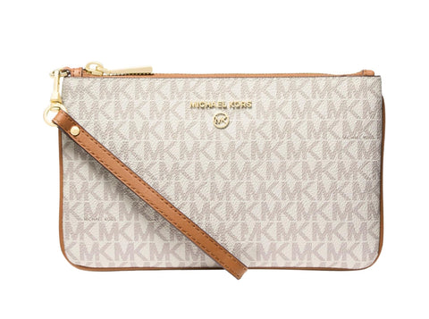 Michael Kors handbag with a brown strap on a white background