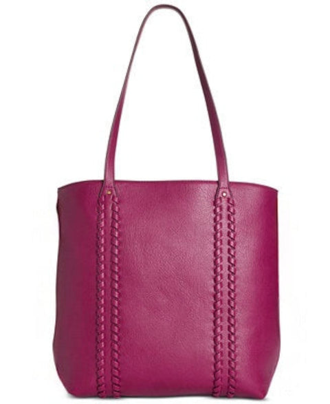 Purple leather tote bag with braided detail on a white background