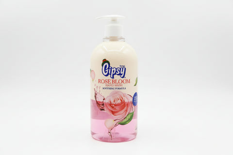 Gipsy Rose Bloom hand wash bottle on a white surface with a blurred background
