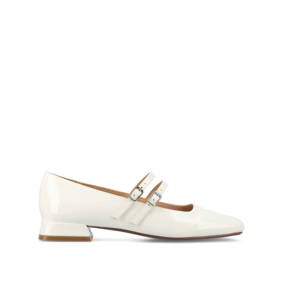 A single white patent leather Mary Jane flat shoe with a low block heel and double strap buckles, shown in profile against a white background.