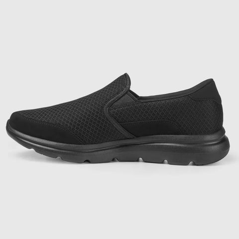 Black slip-on shoe on a light gray background