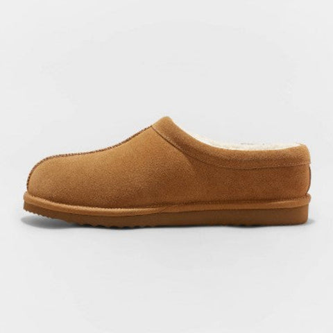 Brown slip-on shoe on a light gray background